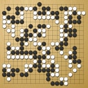 Board position at the end of game EGC 2003 - Round 1 - Game 1: Sung-kyun Pak vs Cornel Burzo