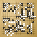 Board position at the end of game EGC 2004 - Round 7 - Game 1: Wataru Miyakawa vs Alexandr Dinerstein